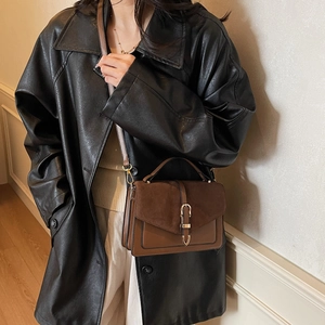 French vintage brown crossbody bag with gold U-buckle and elegant suede texture