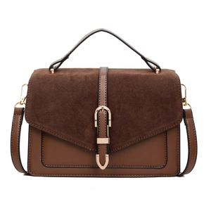 Retro brown contrast color shoulder bag with vintage buckle and golden metal accents