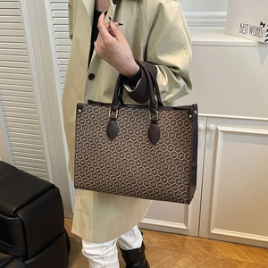 Retro large capacity tote bag with brown hexagon logo print and leather handles