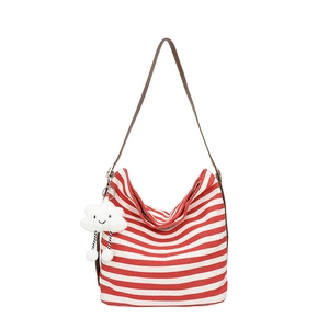 Striped canvas tote bag with red and white patterns and a cute cloud charm pendant