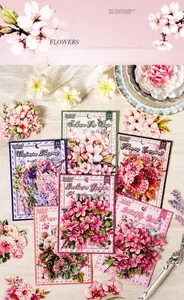 Macro shot of PET floral stickers with transparent backing on light wood surface