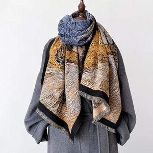 Artistic oil painting style scarf with long tassels and vibrant yellow and navy prints
