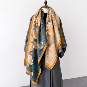 Thick warm winter scarf featuring oil painting ginkgo leaf pattern and tassel fringe edges