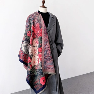 Oil painting style floral scarf with red rose print and blue tassels on grey coat