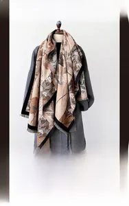 Detailed texture of thick vintage abstract floral cashmere-like scarf with black borders
