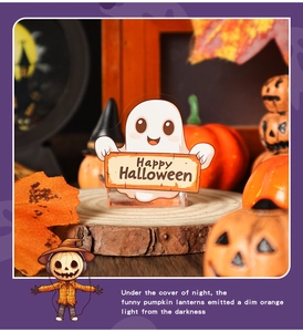 Cute white ghost acrylic table stand with Happy Halloween sign and pumpkin display