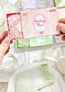 Detail of vintage floral frame paper kit in drawer box for DIY scrapbooking 30pcs