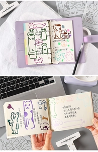 Detail showing 6-hole purple leather binder with grid pages and hand-drawn cat illustrations