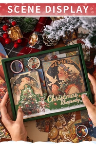 Détail du coffret papeterie de Noël avec carnet de notes, rubans et cartes rétro