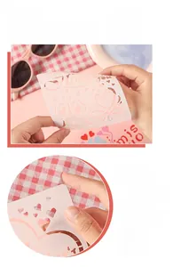 Detail of flexible pink PET stencil showing foldable material and smooth rounded safety edges