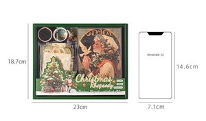 Comparaison de taille entre le coffret de papeterie de Noël et un iPhone