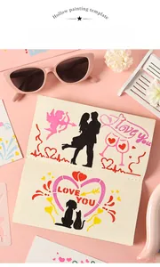 Close-up of PET heart and cupid DIY painting stencil for romantic art crafting
