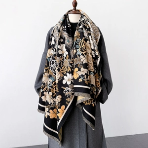 Floral print thick scarf for women with tassels on a black background for autumn and winter