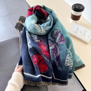 Imitation cashmere scarf with butterfly pattern and fringes in elegant winter scene