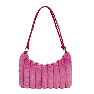 Pink plush tote bag with vertical stripes and faux leather straps on white background