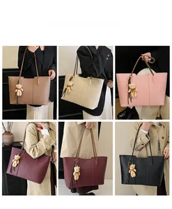 Collage of large tote bags in multiple colors featuring chic bear bag charms and slim straps