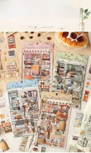 Detail shot of vintage travel-themed die-cut stickers for DIY journaling and scrapbook