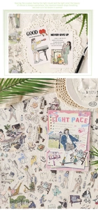 Flat lay of pink PET sticker book and decorative scrapbooking decals on lace texture