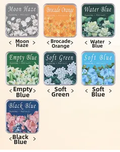 Macro detail of vintage floral ink pads in seven traditional Chinese colors and patterns
