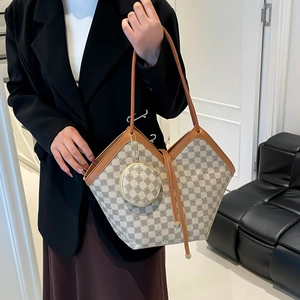 Plaid canvas bucket tote bag with leather trim and matching round coin purse detail