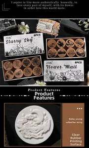 Macro shot of rubber stamps showing detailed floral and celestial patterns on wood