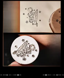 Detail of round beechwood stamps featuring vintage rose, feather and star patterns
