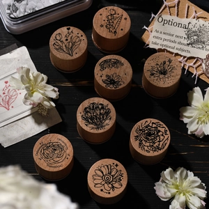 Set of 8 vintage wooden round stamps with intricate floral patterns for scrapbooking