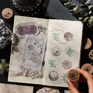 Retro round wooden stamps with floral and starlight sky patterns for DIY journaling