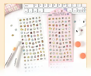 Close-up of 2pcs Little Pudding PET stickers featuring mini food and pet patterns