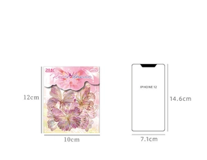 Detail of Flower Dance butterfly stickers with gold foil edges next to a phone for scale