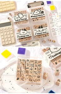Close-up of wooden stamp sets with 36 pieces in transparent boxes for DIY journaling