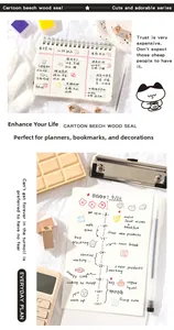 Macro detail of cute wooden stamps used in a planner with aesthetic office props