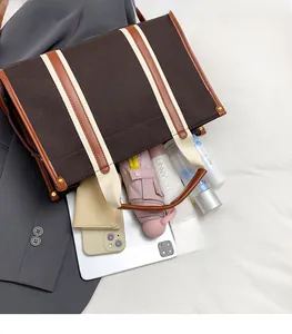 Interior view of spacious canvas tote bag showing large capacity for daily essentials