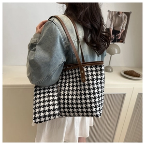Classic houndstooth tote bag set with brown leather trim and matching zipper pouch