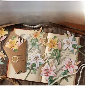 Floral scrapbooking papers with lily motifs and wax seal detail on vintage background