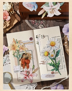Detail of vintage floral stationery paper with gold foil accents for DIY journaling