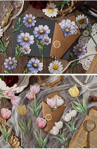 Detail of floral watercolor papers with gold foil stamping and vintage envelope
