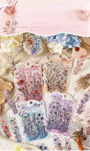 Macro detail of waterproof PET floral stickers in vintage romantic scenery designs