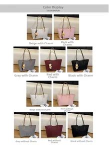 Detail view of leopard embossed tote bags in five colors with optional bear pendants