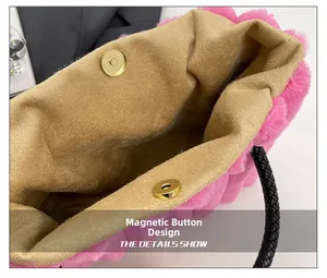 Detail of pink faux fur tote bag with magnetic snap closure and suede lining