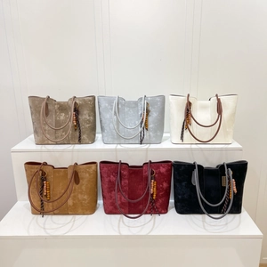 Minimalist large capacity tote bag collection in six elegant colors with tassel pendants