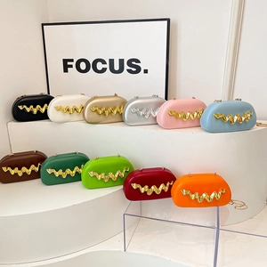 Chic wavy metal acrylic evening clutch bag collection in eleven vibrant colors with gold chains