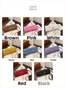 Detail view of ostrich embossed baguette bags in eight colors with gold twist lock