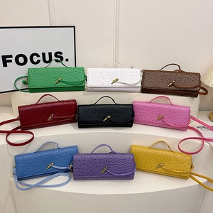 Ostrich pattern leather baguette bags in nine colors with gold metallic buckle and strap