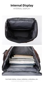 Spacious interior of brown PU backpack showing laptop compartment and large capacity storage