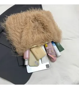 Top view showing spacious interior and winter items inside a faux fur tote bag
