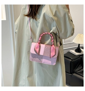 Detailed view of pink tote bag with silk scarf handle and glitter patchwork texture