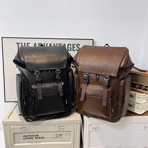 Waterproof PU leather backpack in black and dark brown with flip-top buckle design