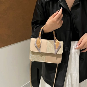 Beige contrast paneled crossbody bag with glitter finish and silk scarf handle detail