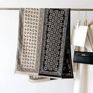Long winter pashmina shawl with beige and black paisley patterns for stylish warmth